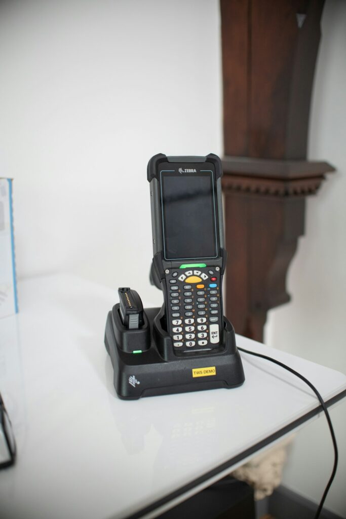Barcode scanner device in charging dock on table