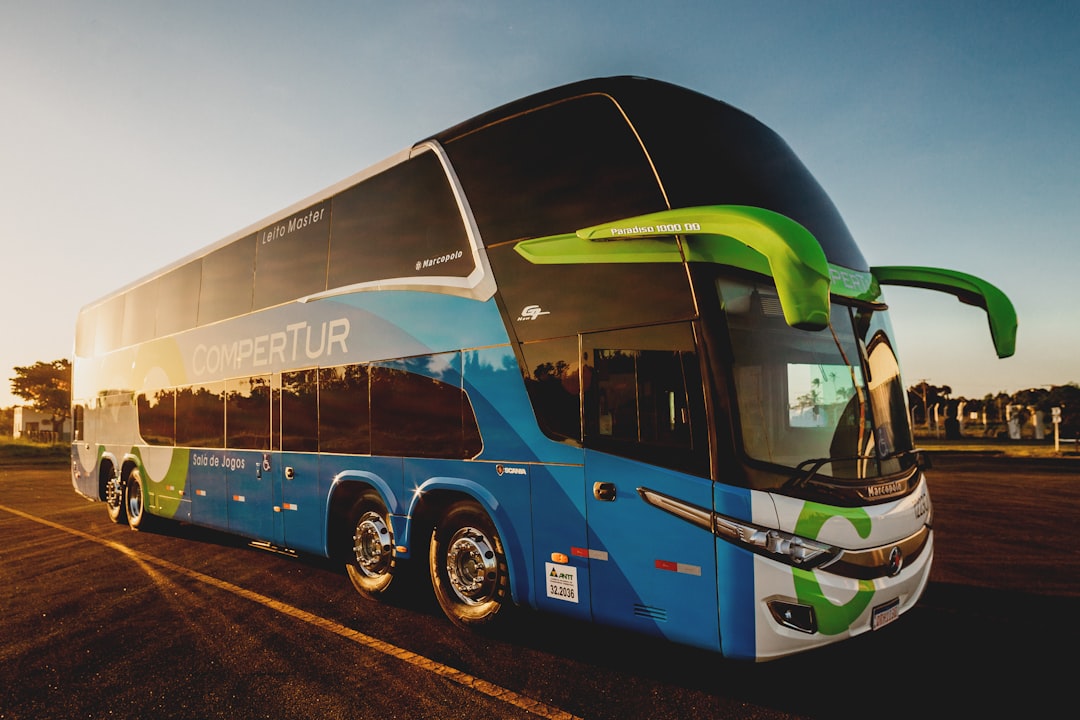 parked blue and black Compertur bus